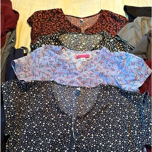 Gently worn figs scrubs 9 tops 8 pants all size Med. sold all together.